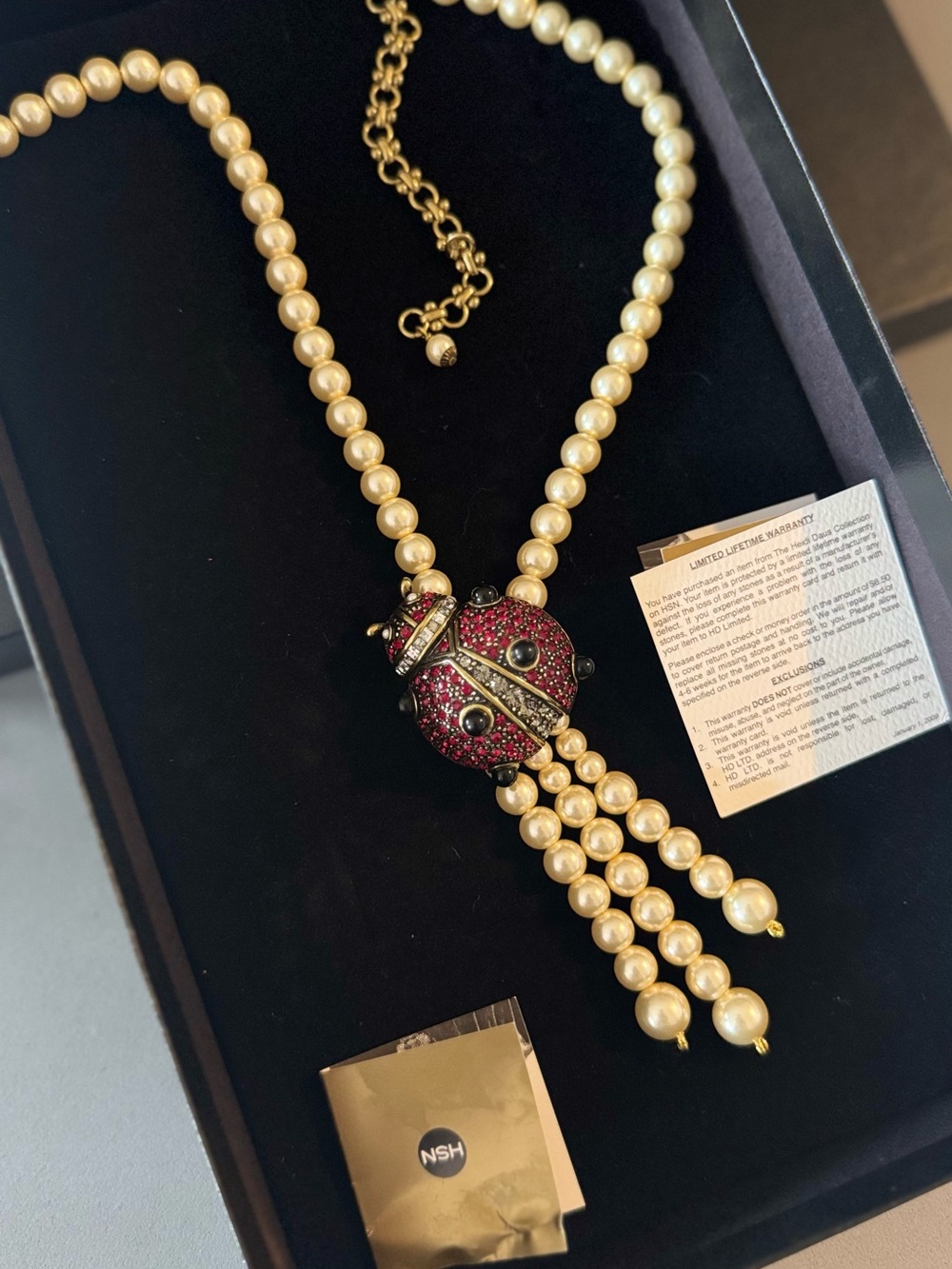 Heidi Daus Pearl Necklace with Red Crystal Ladybug Pendant